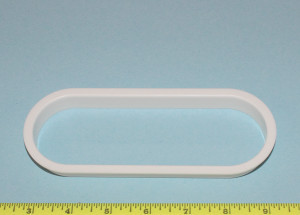 Oval Finishing Grommet 6-1/4″ X 2-3/16″ Inset in dado on counter top or in door or panel